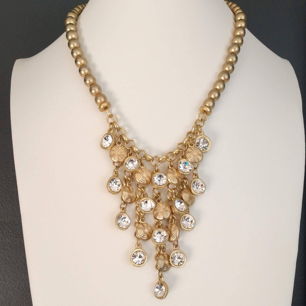 Gold and clear crystal charm tassel necklace